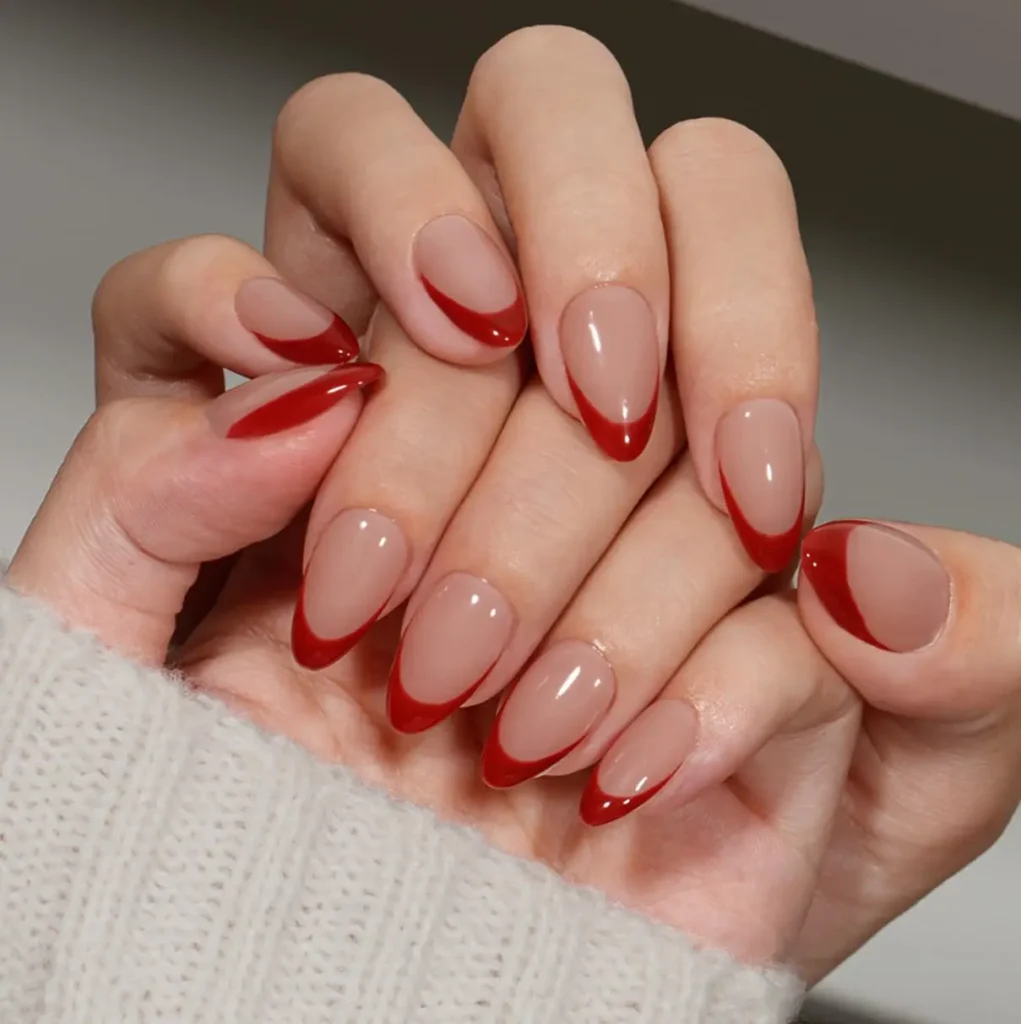 4.Classic French Tip with a Red Stripe Accent