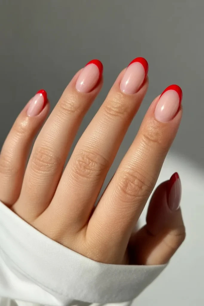 6. Red French Tip June Nails — Bold Classic Update
