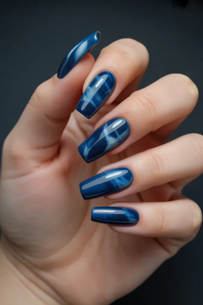 7. Blue Marble Nails — Ocean Depths