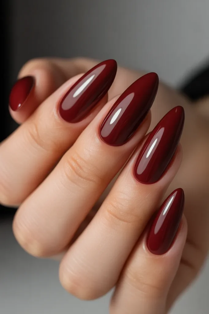 7. Wine Red Nails Almond — Signature Shape