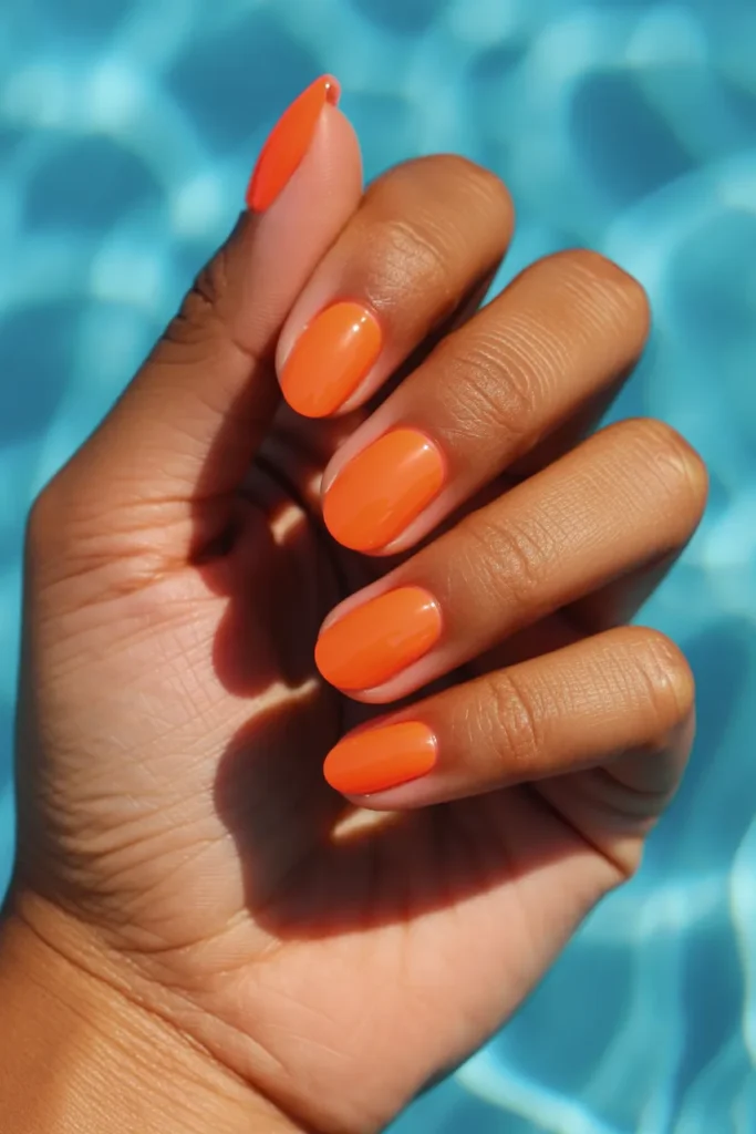 8. Bright Summer Nails — Neon Orange Oval