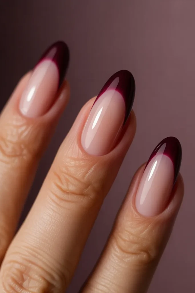 9. Plum Aura Nails — Dark Berry Glow